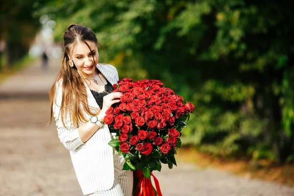 Beautiful Girl Suit Flowers Hands Rose Green Background — Stock Photo, Image