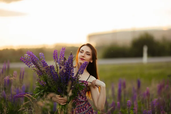 Young Beautiful Girl Holding Large Flower Purple Lupine Flowering Field — Stock Photo, Image