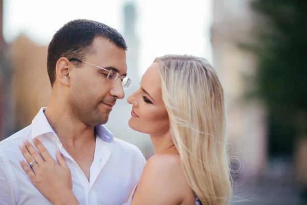 Smiling couple in love outdoors, lviv. summer — Stock Photo, Image