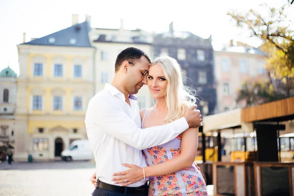 Smiling couple in love outdoors, lviv. summer — Stock Photo, Image