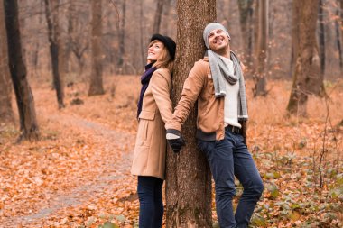 Couple in the park enjoying nice autumn / winter time.