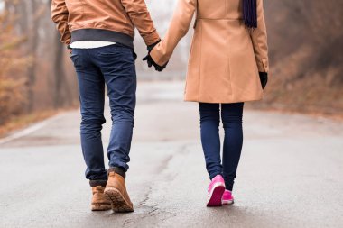 Couple enjoying outdoors in cold autumn / winter time.