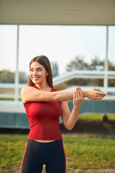 Young Woman Exercising Stretching Urban Park — 스톡 사진