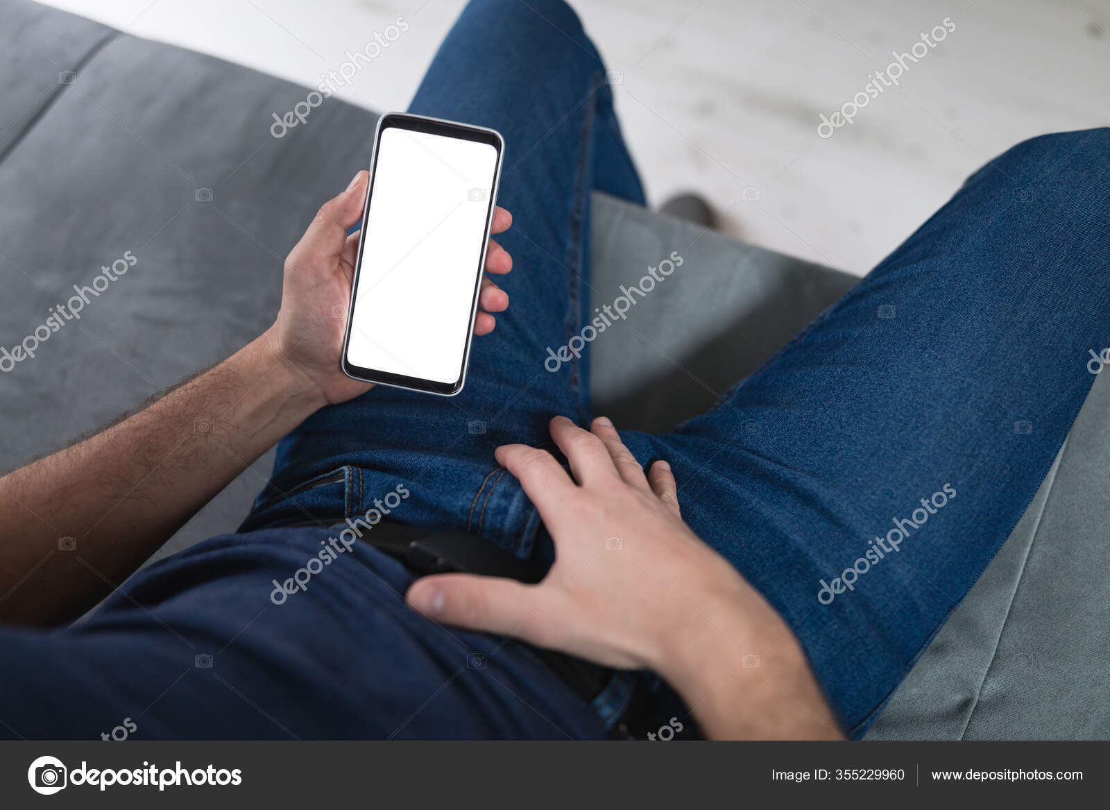Man Holding Modern Smartphone Cellphone Whatching Xxx Videos Home Couch Stock Photo by ©milangucci 355229960 pic