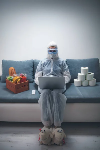 Quarantine and isolation during the virus outbreak - groceries and food in stock, working from home over the internet.