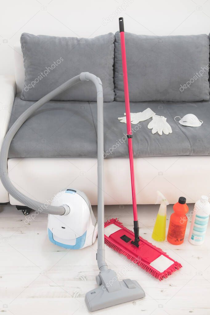 Home, apartment and room sterilization / decontamination, cleaning, vacuuming with vacuum cleaner and chemicals in the time of dangerous viruses.