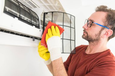 Aircondition service and maintenance, fixing AC unit and cleaning / disinfecting the filters from dangerous pathogens. clipart