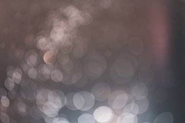 Abstract bokeh from light and water spray in backgrounds of vari