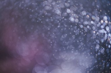 Abstract bokeh from light and water spray in backgrounds of vari