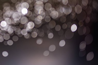 Abstract bokeh from light and water spray in backgrounds of vari