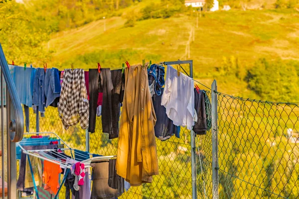 clothes hung out to dry in front of the hills