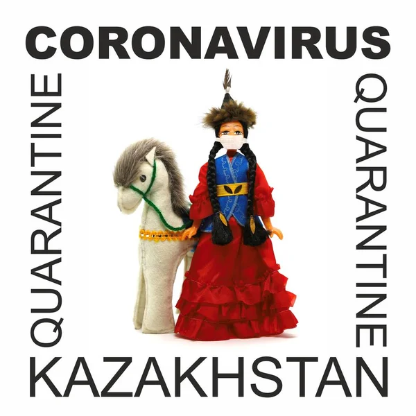 A doll in a Kazakh costume wearing a mask that protects against coronavirus