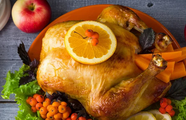 Baked Turkey for family Christmas dinner. Thanksgiving, holiday food.Top view, close-up