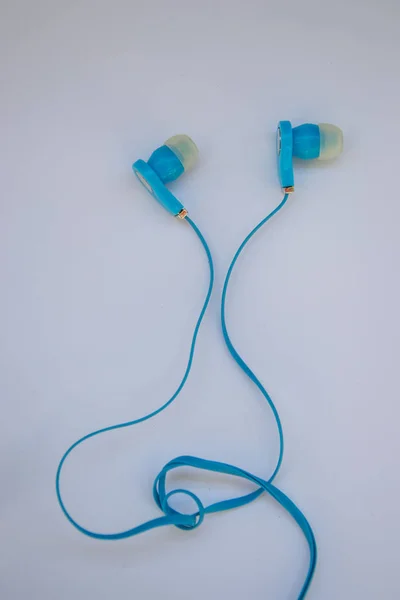 Close Isolated Blue Earphones Purple Background Technology — Stock Photo, Image