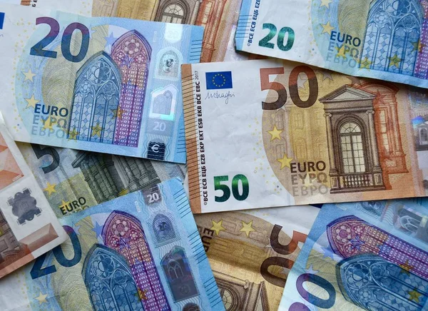 European Union currency, top view of mixed euro banknotes. Many euro bills background. Euro money