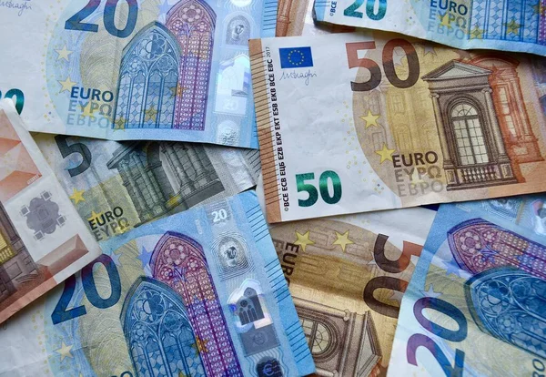 European Union currency, top view of mixed euro banknotes. Many euro bills background. Euro money