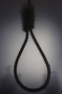 Gölge bulanıklık ip ilmik asılı adam el Holding