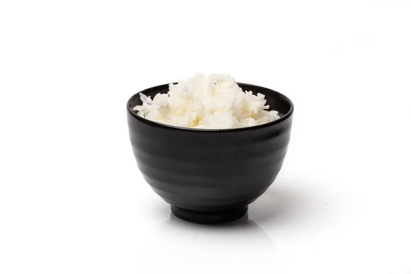 Κοντινό Πλάνο Ρύζι Μαύρο Μπολ Απομονώνονται Λευκό Φόντο — Φωτογραφία Αρχείου