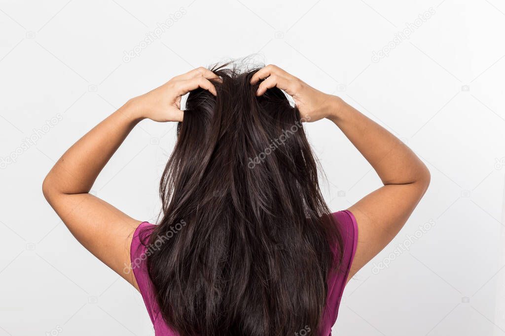 Women itching scalp itchy his hair on a white background