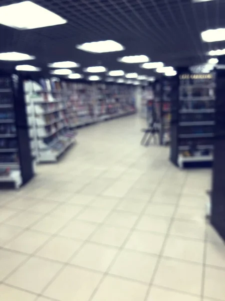 Out of focus bookstore. Blur shelves with books. — Stock Photo, Image