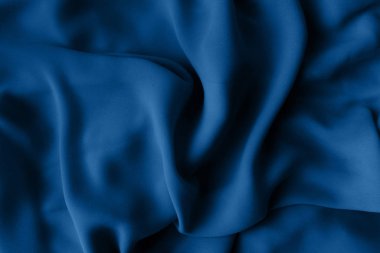 Pürüzsüz mavi tekstil. İpek, saten.
