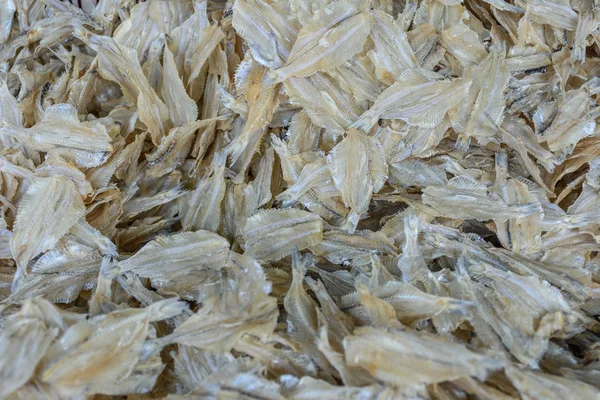 Small dried fish in an Asian market.