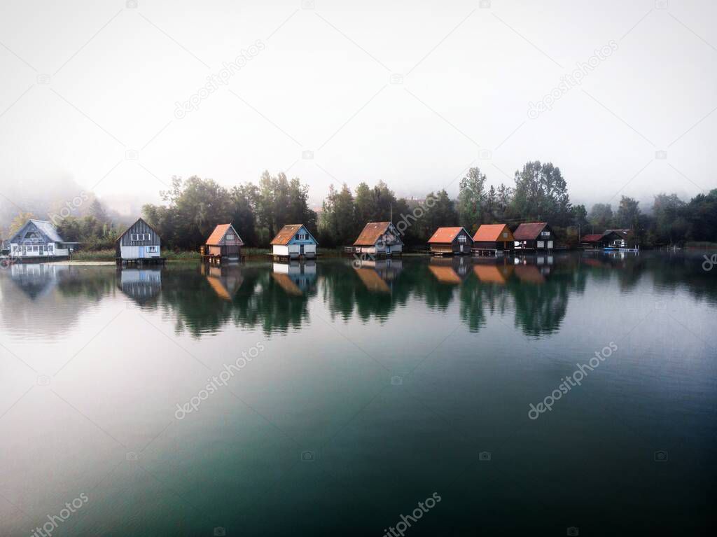 Boat houses at Grosser Alpsee in the Allgaeu in Bavaria