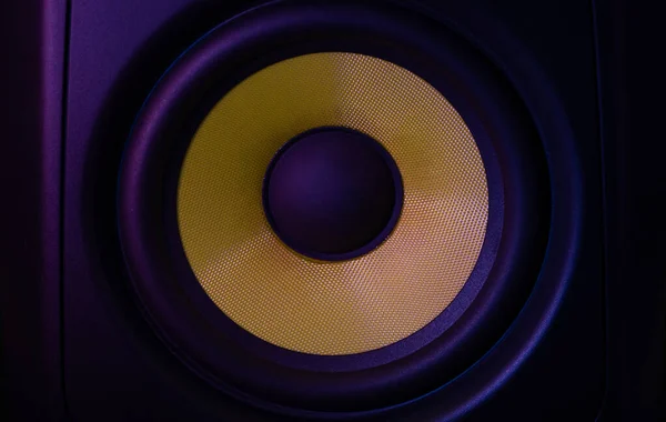 Close-up shot of a studio speaker with stage lighting, music concept — Stock Photo, Image