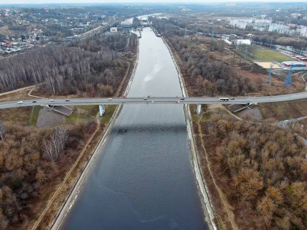 Aerial view panorama of the railway bridge over the river. Beautiful natural landscape with drone