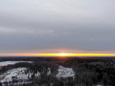 Aerial view a beautiful panoramic landscape of nature at dawn on a freezing day in winter