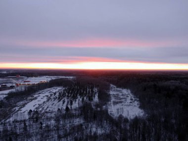 Aerial view a beautiful panoramic landscape of nature at dawn on a freezing day in winter