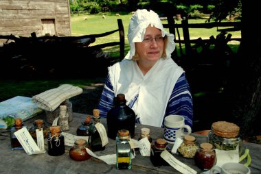 Sleepy Hollow, NY: Docent with Medicines and Potions clipart