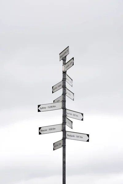 Pole Signs Indicating Distances Capitals World Nyksund Norway — Stock Photo, Image