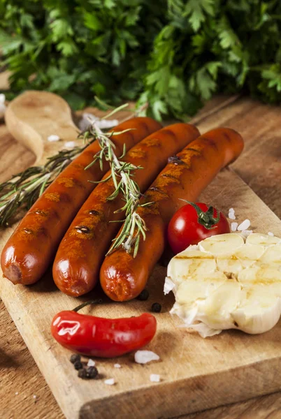 Wiener Sausages on wooden background — Stock Photo, Image