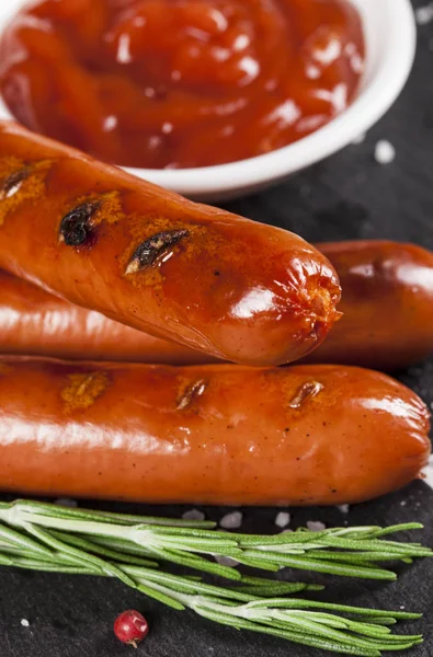 Wiener Sausages on black background. Top view. — Stock Photo, Image