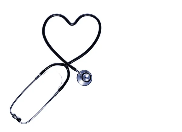 Stethoskop in Herzform isoliert auf weißem Hintergrund. — Stockfoto