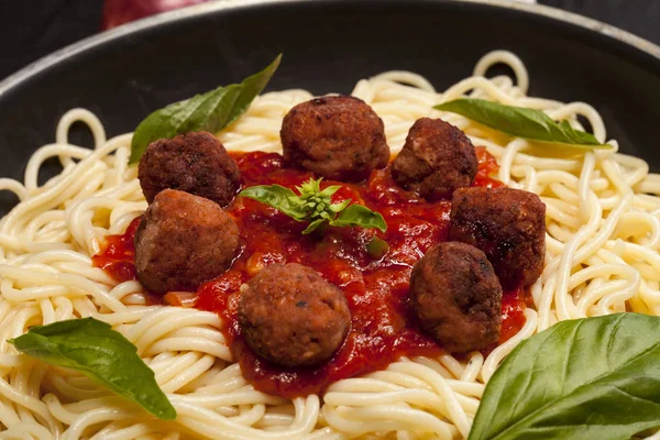 Spaghetti pasta with meatballs and tomato sauce, selective focus — Stock Photo, Image
