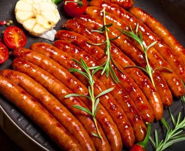 Closeup of Wiener Sausages in a pan — Stock Photo, Image