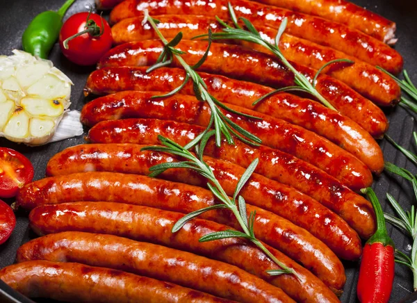 Closeup of Wiener Sausages in a pan — Stock Photo, Image