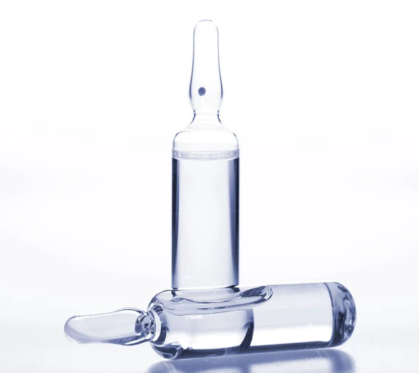 Glass medicine ampoules on a white background — Stock Photo, Image