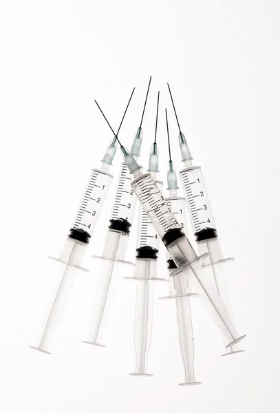 Syringe on white background with copy space — Stock Photo, Image