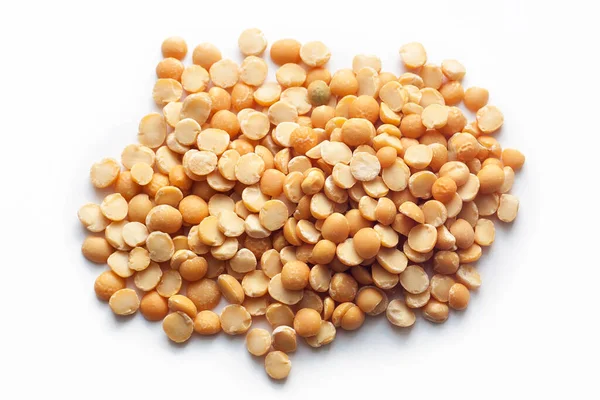 Beyaz zemin üzerinde sarı şekilli vitaminler virüse iyi gelir.