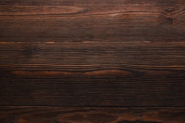 Koyu ahşap kaplama arka plan. Sıcak atmosfer. Yaratıcı alan ve kopyalama alanı. Düzlük için güzel bir zemin.