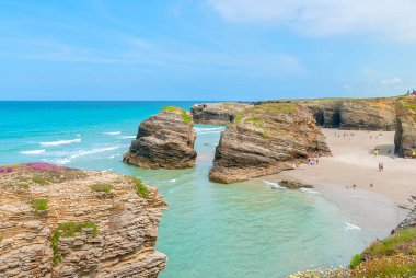 Famous beach of the Cathedrals (Playa de las Catedrales) in Ribadeo, Galicia, Spain clipart