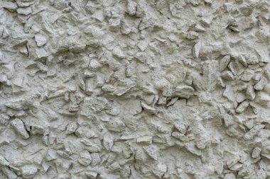 Arkaplan: Büyük granit molozlardan yapılmış beton ürün