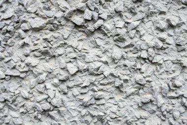 Arkaplan: Büyük granit molozlardan yapılmış beton ürün