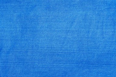 Açık mavi kot kumaşı yakından çekildi