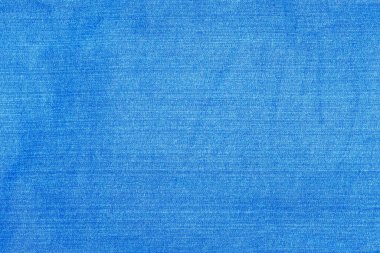 Açık mavi kot kumaşı yakından çekildi