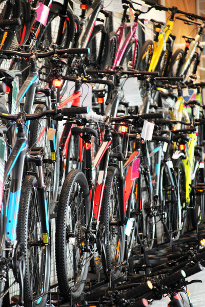 Many bicycles for in a Phnom Penh store, vertical photo