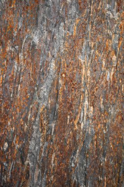 Demir çizgileri olan bir taş taşıyüzeyinin soyut arka planı